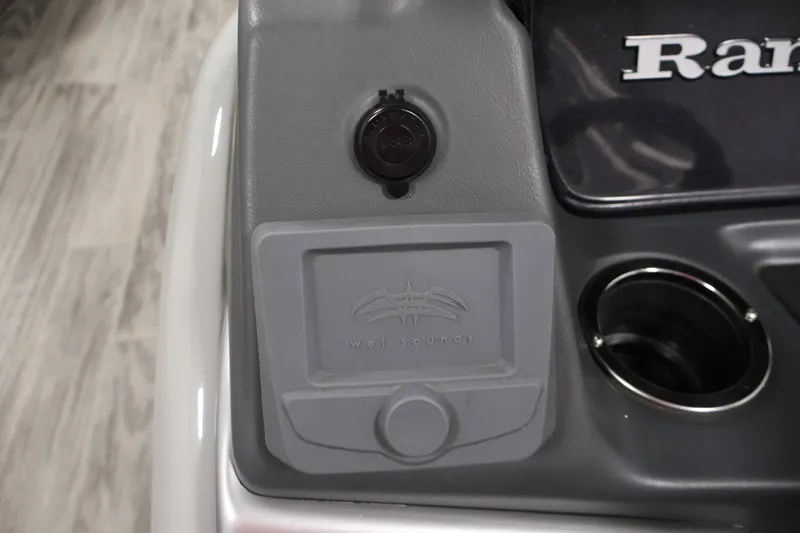 Slide: The Image of 2025 Ranger Reata 220C boat console with Wet Sounds audio system and cup holder. - 24