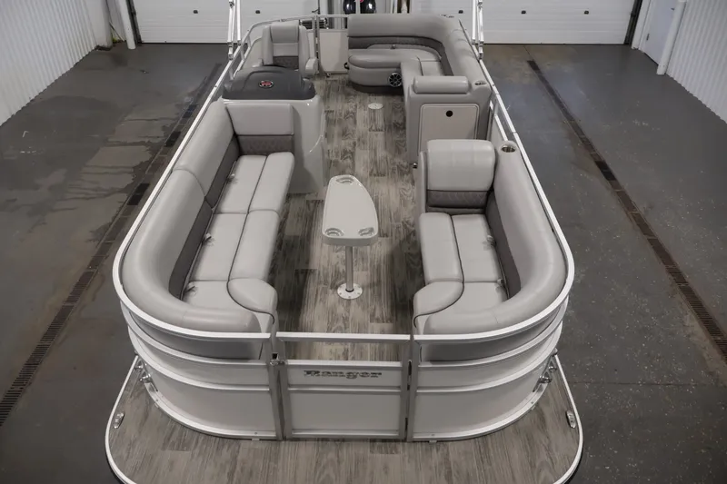 Slide: The Image of 2025 Ranger Reata 220C pontoon boat with spacious seating and modern design. - 9