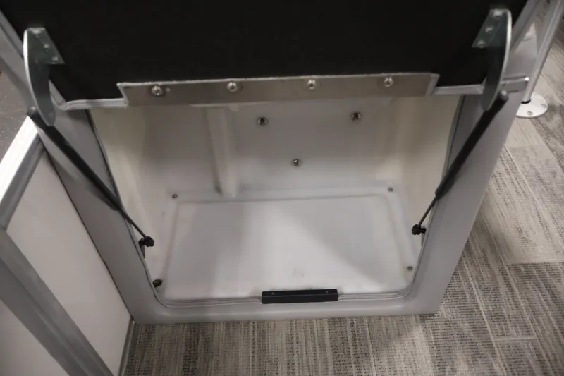 Slide: The Image of Storage compartment of 2025 Ranger Reata 220C boat, featuring durable interior design. - 20
