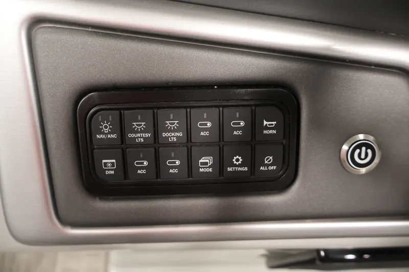 Slide: The Image of Control panel of 2025 Ranger Reata 220C with various function buttons. - 27