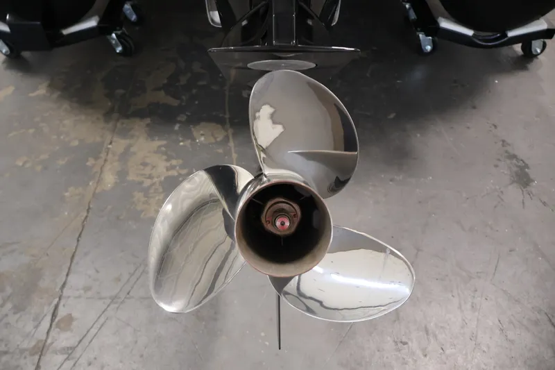 Slide: The Image of Shiny propeller of 2025 Ranger Reata 220C boat on concrete floor. - 41