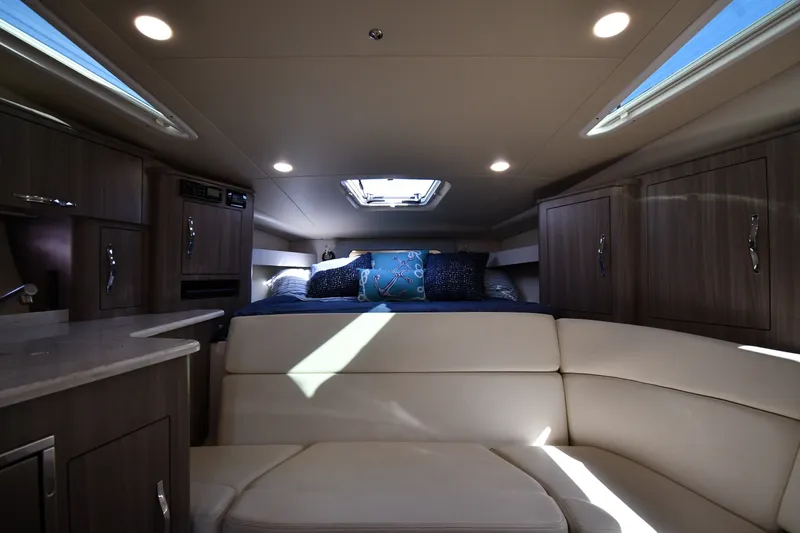 Slide: The Image of Luxurious interior of 2021 Regal 35 Sport Coupe with modern furnishings and ambient lighting. - 27