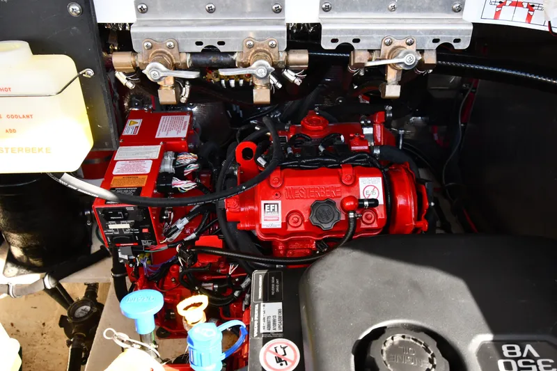 Slide: The Image of Engine compartment of a 2021 Regal 35 Sport Coupe, featuring a Westerbeke generator. - 53
