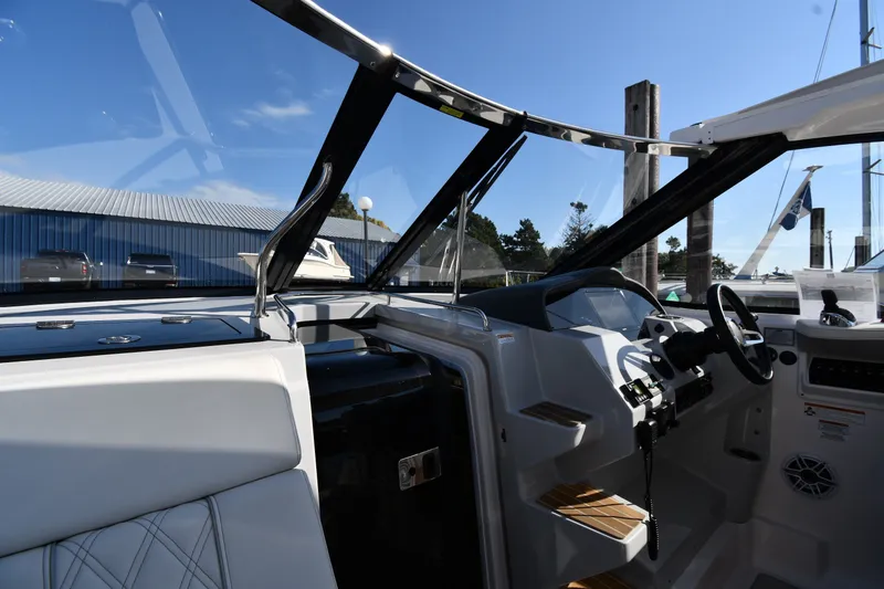 Slide: The Image of 2021 Regal 35 Sport Coupe cockpit with modern controls and sleek design. - 9