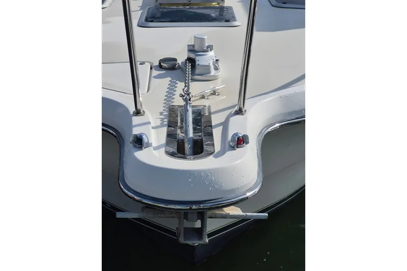 Slide: The Image of Bow of a 1996 Pursuit 3000 Offshore boat with anchor and chain. - 67