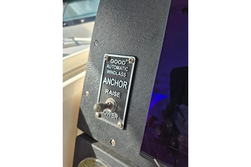 Slide: The Image of Control panel for anchor windlass on 1996 Pursuit 3000 Offshore boat. - 56