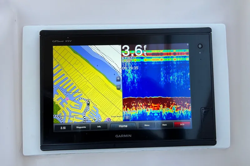 Slide: The Image of Garmin GPSMAP XSV displaying navigation and sonar data on Grady-White Freedom 275, 2008 model. - 10