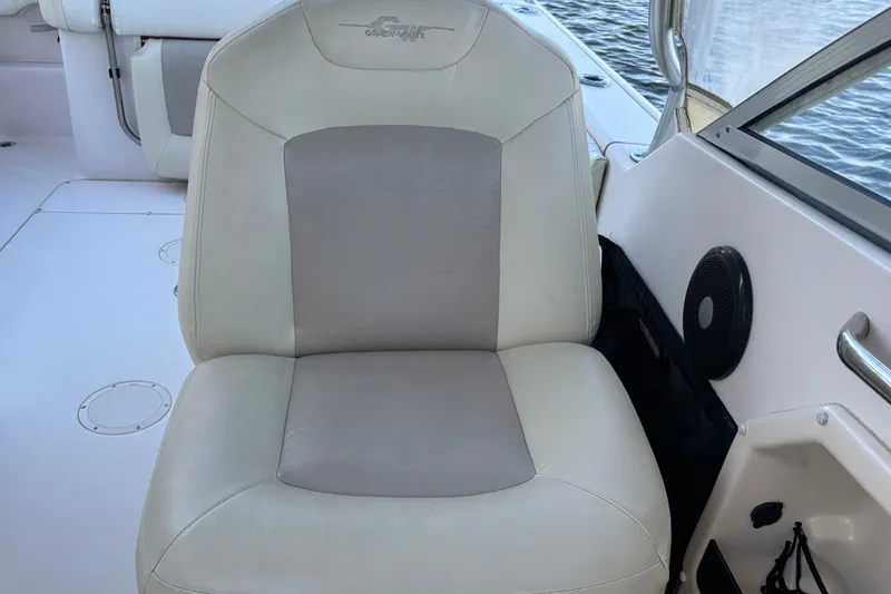 Slide: The Image of Grady-White Freedom 275 boat seat, 2008 model, with white and gray upholstery. - 18