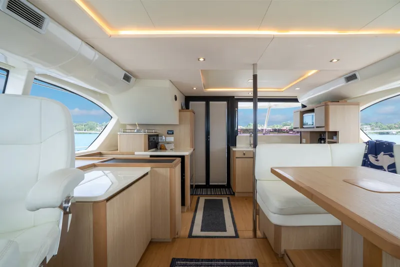 Slide: The Image of Luxurious interior of 2018 Aquila 44 Yacht with modern furnishings and panoramic windows. - 20