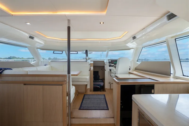 Slide: The Image of Interior of 2018 Aquila 44 Yacht, featuring modern design and spacious seating area. - 19