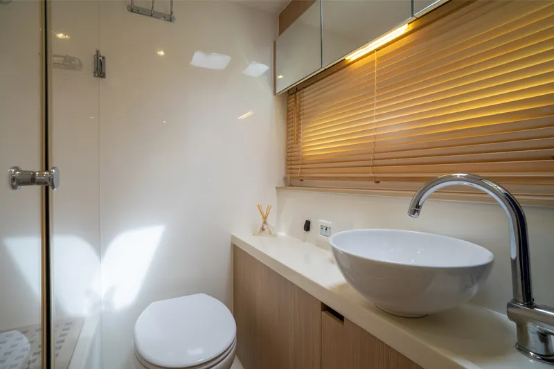 Slide: The Image of Luxurious bathroom interior of 2018 Aquila 44 Yacht with modern fixtures and elegant design. - 31