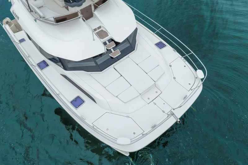 Slide: The Image of Aerial view of 2018 Aquila 44 Yacht on clear blue water. - 14