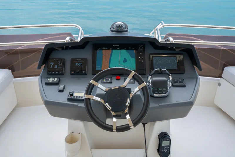 Slide: The Image of Control panel of 2018 Aquila 44 Yacht with navigation and steering systems. - 36