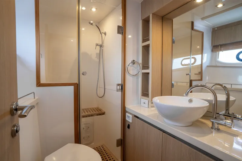 Slide: The Image of Luxurious bathroom interior of 2018 Aquila 44 Yacht with modern fixtures and elegant design. - 28