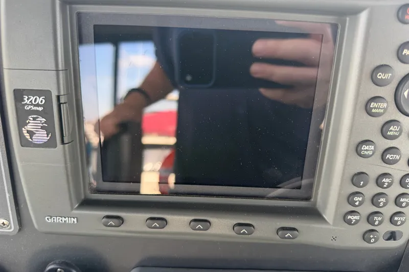Slide: The Image of Garmin 3206 GPSmap device on a 1996 WEIST 62 Convertible boat. - 44