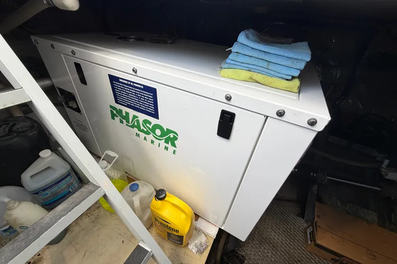 Slide: The Image of Engine room of 1996 WEIST 62 Convertible with Phasor Marine generator and supplies. - 33
