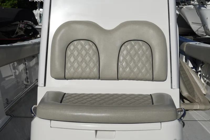 Slide: The Image of 2022 Sportsman Open 282TE Center Console boat seat with diamond-stitched upholstery. - 21
