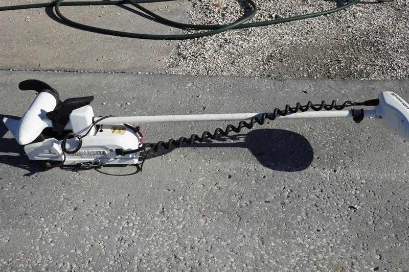 Slide: The Image of Trolling motor on pavement, compatible with 2022 Sportsman Open 282TE Center Console boat. - 20