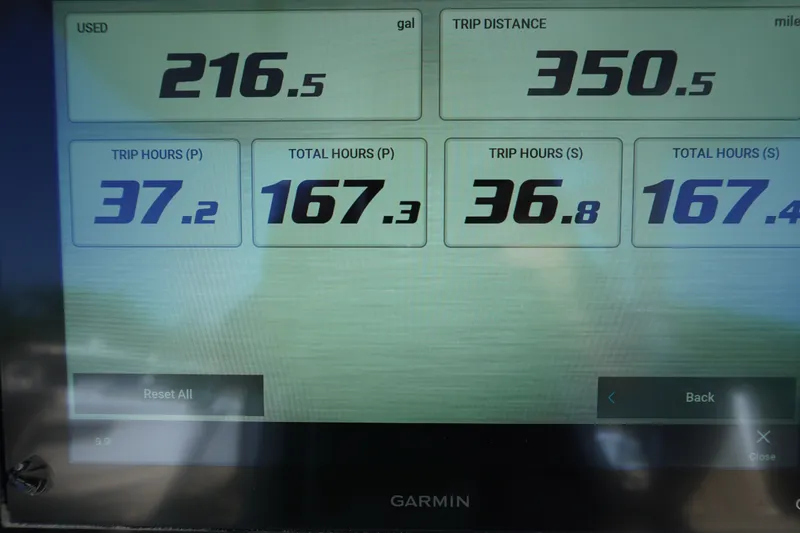 Slide: The Image of Display screen showing trip data for Sportsman Open 282TE Center Console, 2022 model. - 14