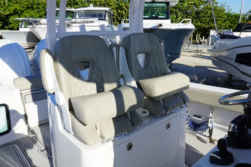 Slide: The Image of 2022 Sportsman Open 282TE Center Console with dual cushioned seats and armrests. - 9