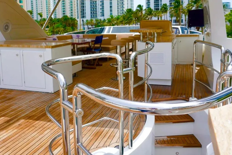 Slide: The Image of Luxurious 2015 Azimut 84 yacht deck with polished railings and elegant seating area. - 18