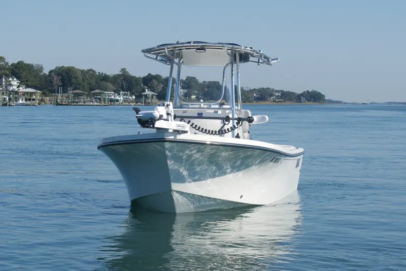 Slide: The Image of 2023 Parker 2300 Special Edition boat on calm water, showcasing sleek design and modern features. - 4