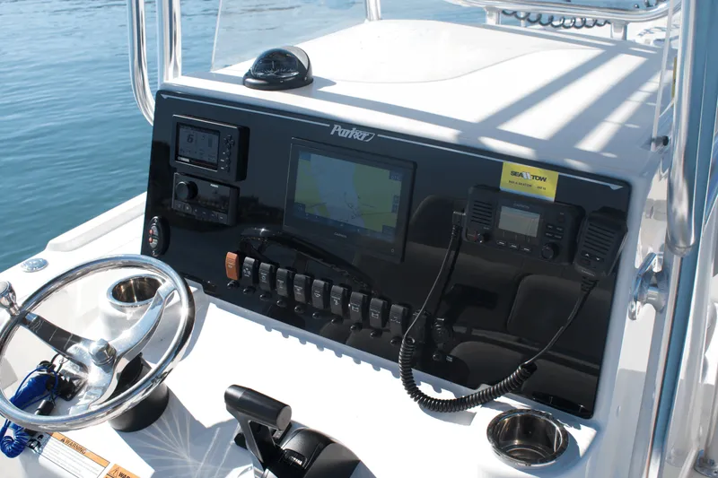 Slide: The Image of Control panel of 2023 Parker 2300 Special Edition boat with navigation and communication equipment. - 14
