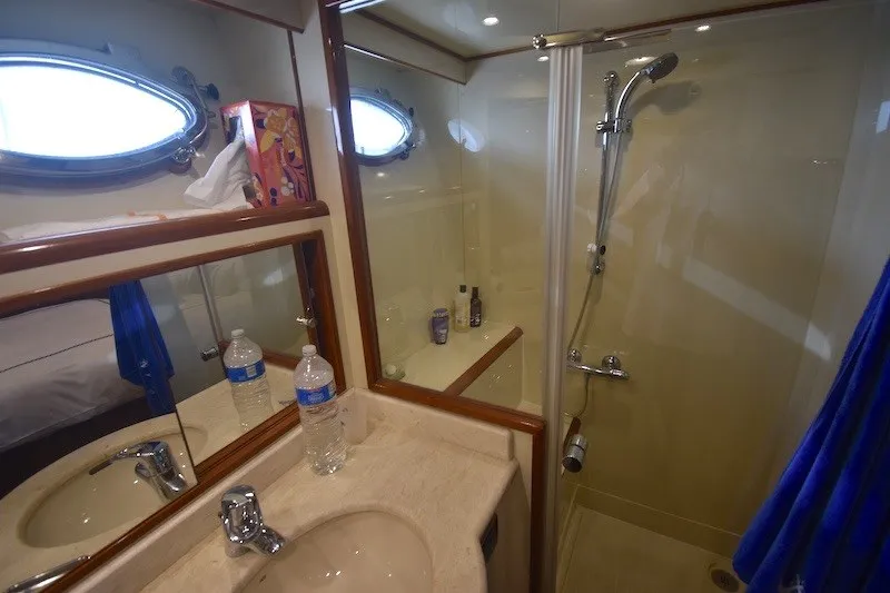 Slide: The Image of Bathroom interior of 2004 Ocean Alexander 58 Pilothouse yacht with shower and sink. - 27