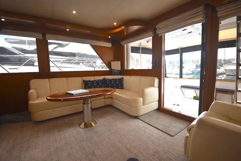 Slide: The Image of Luxurious interior of 2004 Ocean Alexander 58 Pilothouse yacht with plush seating and elegant decor. - 8