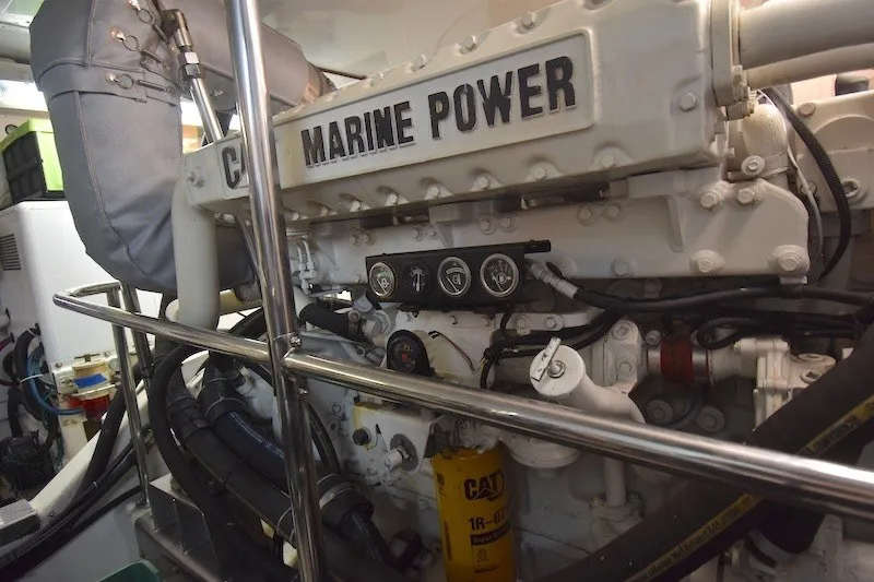 Slide: The Image of Engine room of 2004 Ocean Alexander 58 Pilothouse yacht, featuring CAT Marine Power engine. - 45