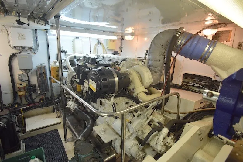Slide: The Image of Engine room of 2004 Ocean Alexander 58 Pilothouse yacht, showcasing mechanical components and systems. - 41