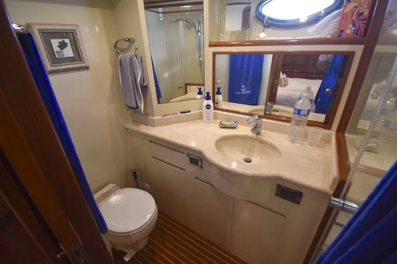 Slide: The Image of Luxurious bathroom in 2004 Ocean Alexander 58 Pilothouse yacht with elegant fixtures. - 26