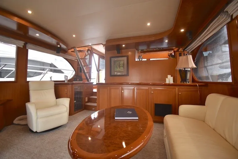 Slide: The Image of Luxurious interior of 2004 Ocean Alexander 58 Pilothouse yacht with elegant wood finishes. - 11