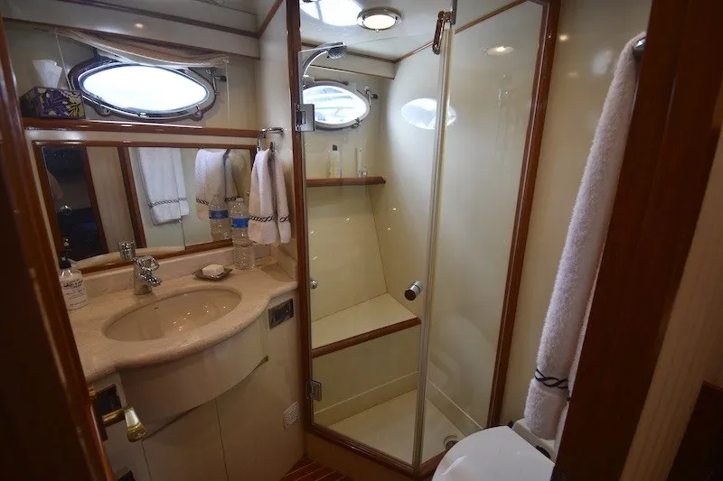 Slide: The Image of Luxurious bathroom in 2004 Ocean Alexander 58 Pilothouse yacht with shower and vanity. - 20