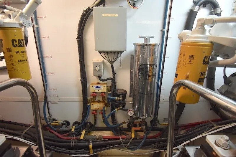 Slide: The Image of Engine room of 2004 Ocean Alexander 58 Pilothouse with CAT filters and wiring. - 42