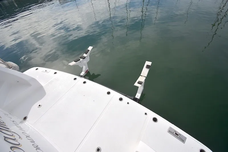 Slide: The Image of 2004 Ocean Alexander 58 Pilothouse swim platform with davit system on calm water. - 5