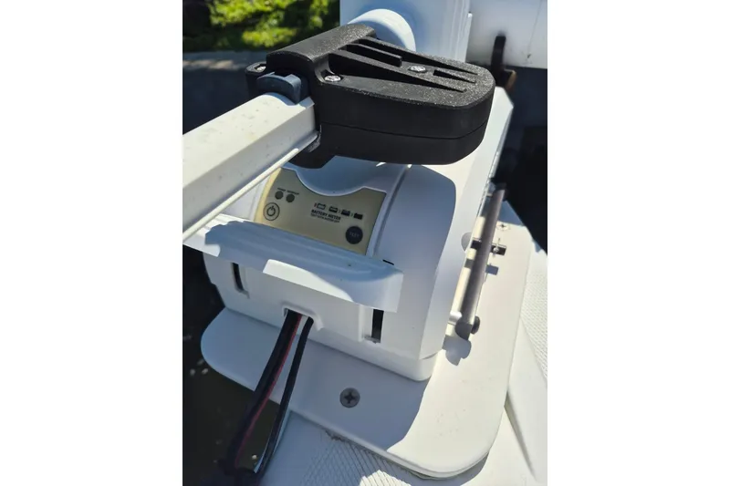 Slide: The Image of Close-up of a 2000 Pro-Line 24 Sport boat component with wiring and control panel. - 27