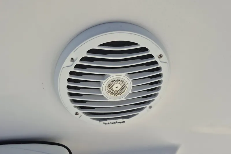 Slide: The Image of Marine speaker on a 2000 Pro-Line 24 Sport boat ceiling. - 38