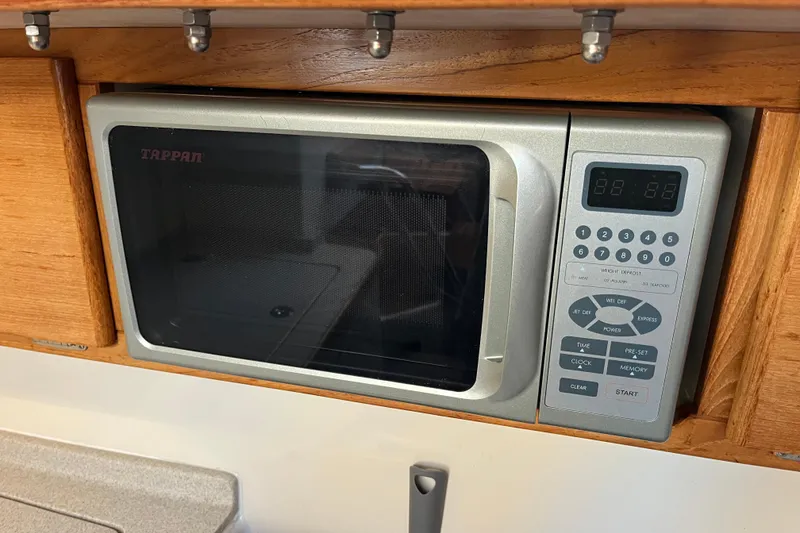 Slide: The Image of Built-in Tappan microwave in a 2005 Catalina 320 yacht kitchen. - 12