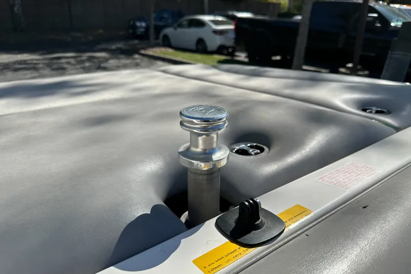 Slide: The Image of 2008 Centurion Air Warrior Elite Bowrider boat detail with chrome hardware and gray upholstery. - 17