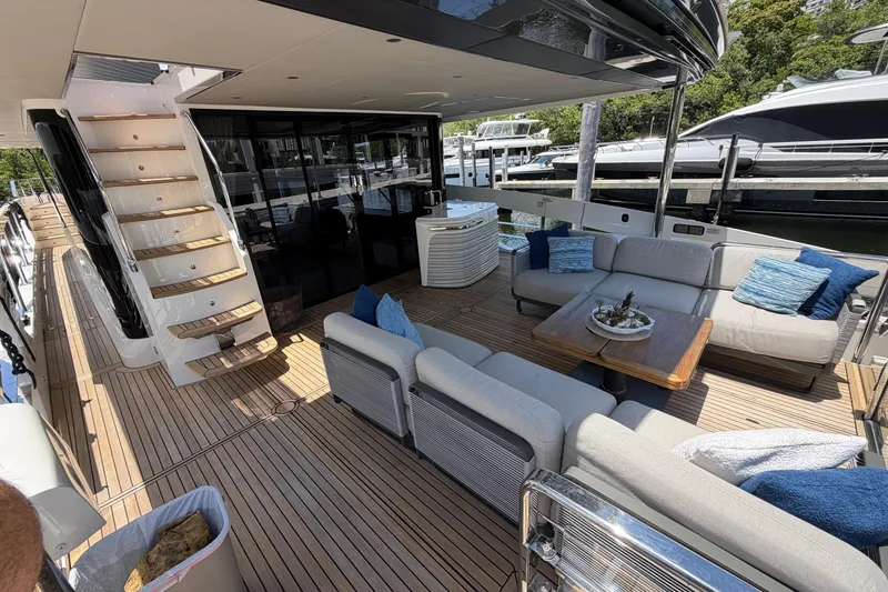 Slide: The Image of Luxurious 2024 Absolute Navetta 75 yacht deck with elegant seating and modern design. - 2
