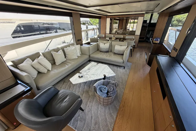 Slide: The Image of Luxurious interior of 2024 Absolute Navetta 75 yacht with elegant seating and modern decor. - 3