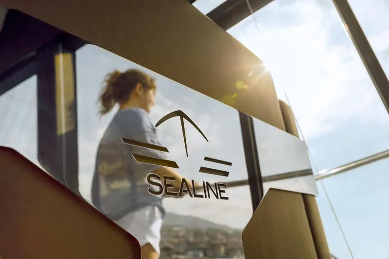 Slide: The Image of 2026 Sealine C430 yacht with logo, person enjoying sunny view. - 18