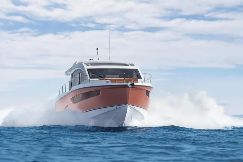 The Image of 2026 Sealine C430 yacht cruising on open water under a clear sky. - 1