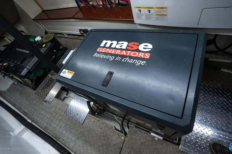 Slide: The Image of Engine room of 1981 Thackwray Motorsailor featuring Mase generator. - 80
