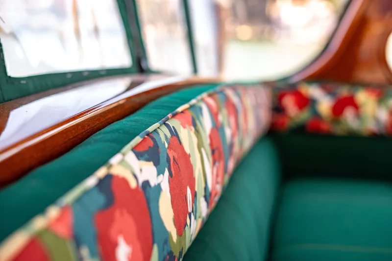 Slide: The Image of Interior of 1981 Thackwray Motorsailor with floral upholstery and wooden trim. - 50