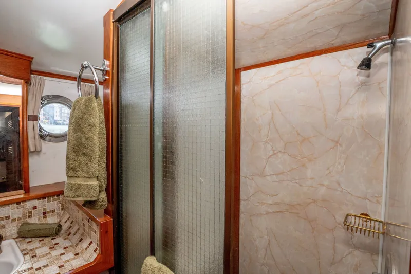 Slide: The Image of Bathroom interior of 1981 Thackwray Motorsailor with shower and porthole window. - 108