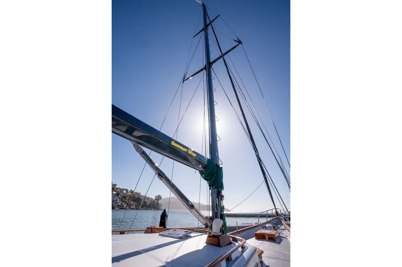 Slide: The Image of Sailing mast of 1981 Thackwray Motorsailor against clear blue sky. - 15