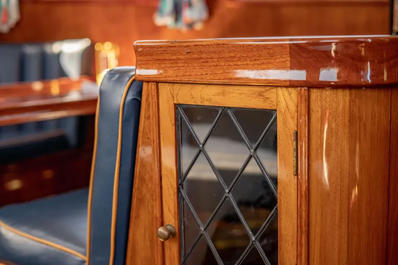 Slide: The Image of Luxurious wooden interior of a 1981 Thackwray Motorsailor yacht with elegant detailing. - 67