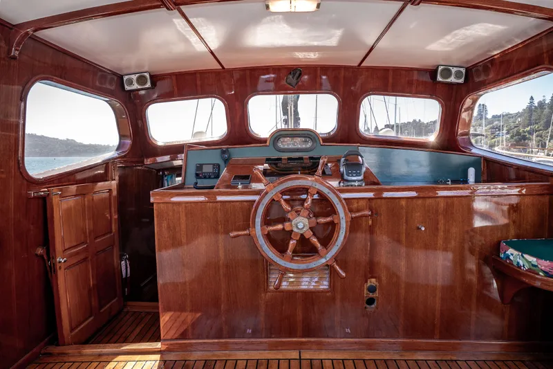 Slide: The Image of Interior of 1981 Thackwray Motorsailor with wooden helm and nautical instruments. - 77